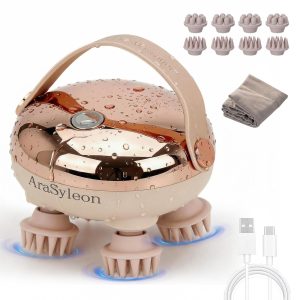Masseur de cuir chevelu électrique cuivre rosé en forme de dôme, poignée et quatre pieds en silicone à picots